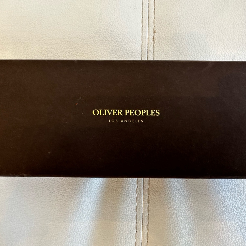 Oliver Peoples NEVER worn.  Brand new condition.